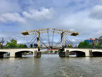 View of bridge over river against sky