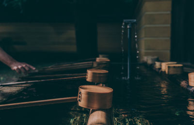 Close-up of ladles at japanese fountain