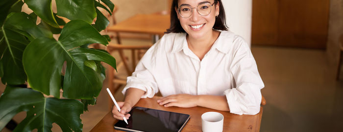 Young woman using mobile phone