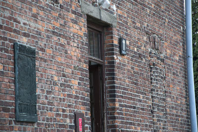 Low angle view of brick wall