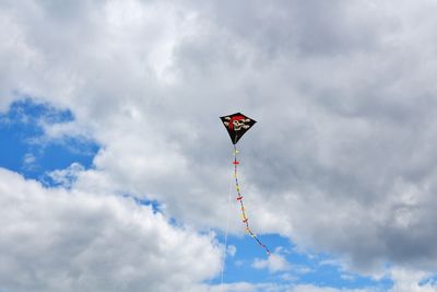 Low angle view of kite against sky