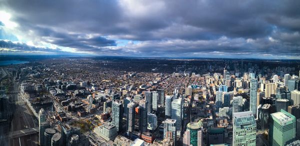 High angle view of modern buildings in city against sky