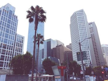 Low angle view of skyscrapers against sky