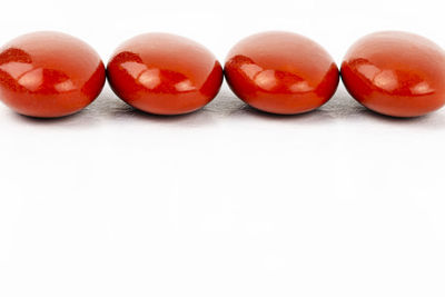 Close-up of fruits against white background