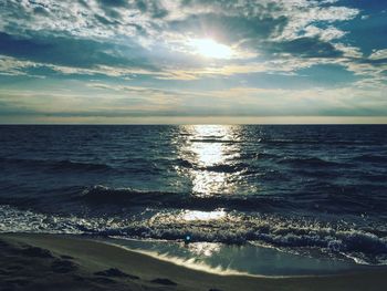 View of calm beach against the sky