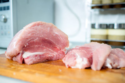 Close-up of meat on cutting board