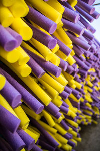 Yellow and purple sponges for sale at market