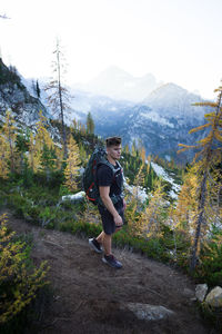 Full length of man on mountain against sky