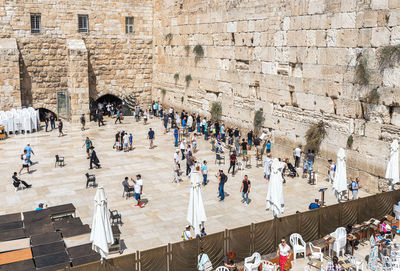 Group of people on the wall