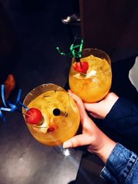 High angle view of woman holding drink