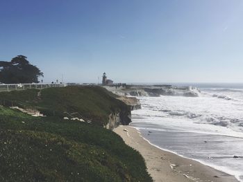 View of beach against clear sky