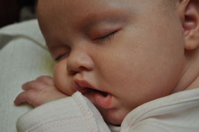 Close-up of baby girl sleeping