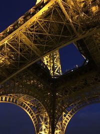 Low angle view of illuminated bridge