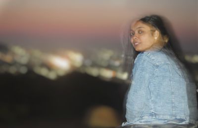 Portrait of a woman looking away