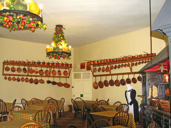 Illuminated lanterns hanging on chair