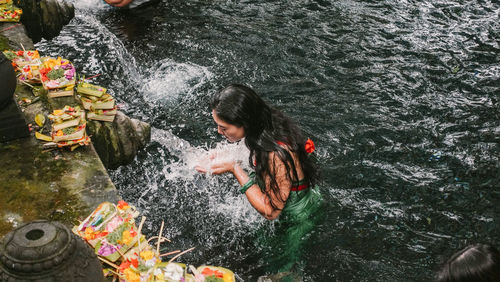 High angle view of women in river