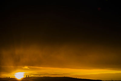 Sun shining through clouds