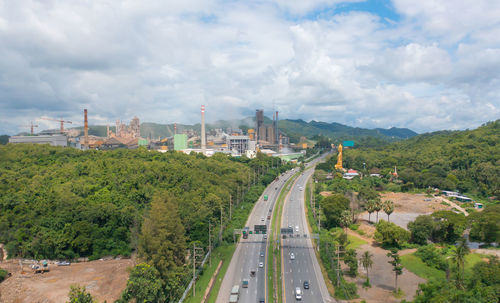 High angle view of cars on road against sky