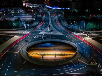 High angle view of light trails on road in city