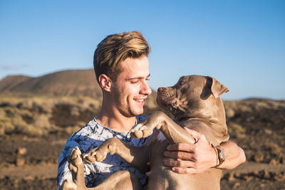 Young man with dog