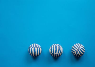 Close-up of candies against blue background