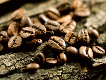 Close-up of coffee beans on table