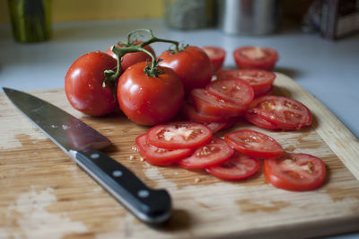 Close-up of tomatoes on cutting board