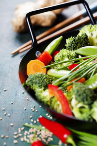 Close-up of chopped vegetables on table