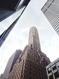 Low angle view of skyscrapers against sky