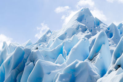 Aerial view of frozen landscape against sky