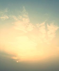 Low angle view of clouds in sky during sunset