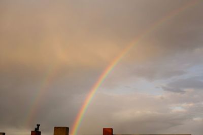 Low angle view of rainbow over the sky