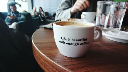 Close-up of coffee cup on table