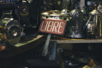 Close-up of antique objects for sale at store