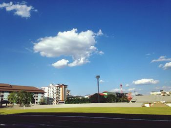 View of city against cloudy sky