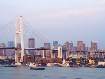 View of suspension bridge in city