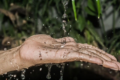 Water splash on the hand, perfect for your articles and advertisements