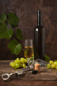 Close-up of fruits in bottles on table