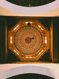 Low angle view of illuminated ceiling