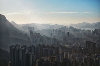 Panoramic view of buildings in city against sky