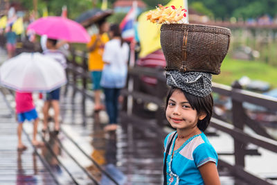 Portrait of smiling boy on street