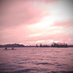 View of calm sea against cloudy sky