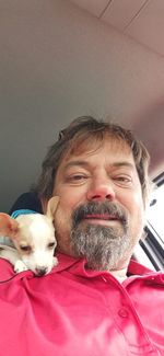 Portrait of woman with dog