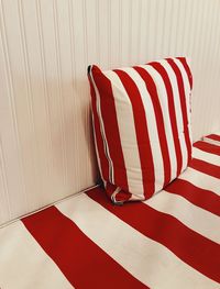 Red umbrella on wall at home