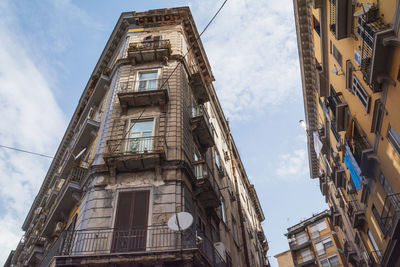 Low angle view of old building against sky