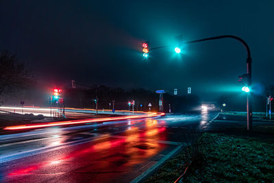 Light trails on road at night