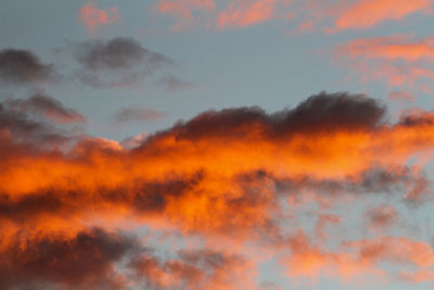 Low angle view of dramatic sky during sunset