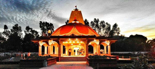 View of temple against cloudy sky