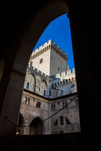 Low angle view of old building against sky