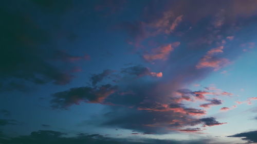 Low angle view of dramatic sky during sunset